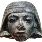 Part of a statue depicting Ramses I as a scribe during the reign of Horemheb.